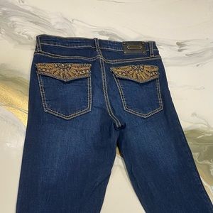 Vintage low waisted tru luxe flared jeans with bedazzled pockets